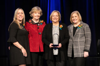 Gail Skoglund accepted the Outstanding Leadership Award at the LeadingAge Minnesota Institute, the state’s largest and most comprehensive aging services conference attended by more than 3,000 older adult services professionals. With Skoglund is Jennifer Rutschke, Awards & Recognition Committee Chair, Barbara Klick, Board Chair, and Kari Thurlow, President & CEO.